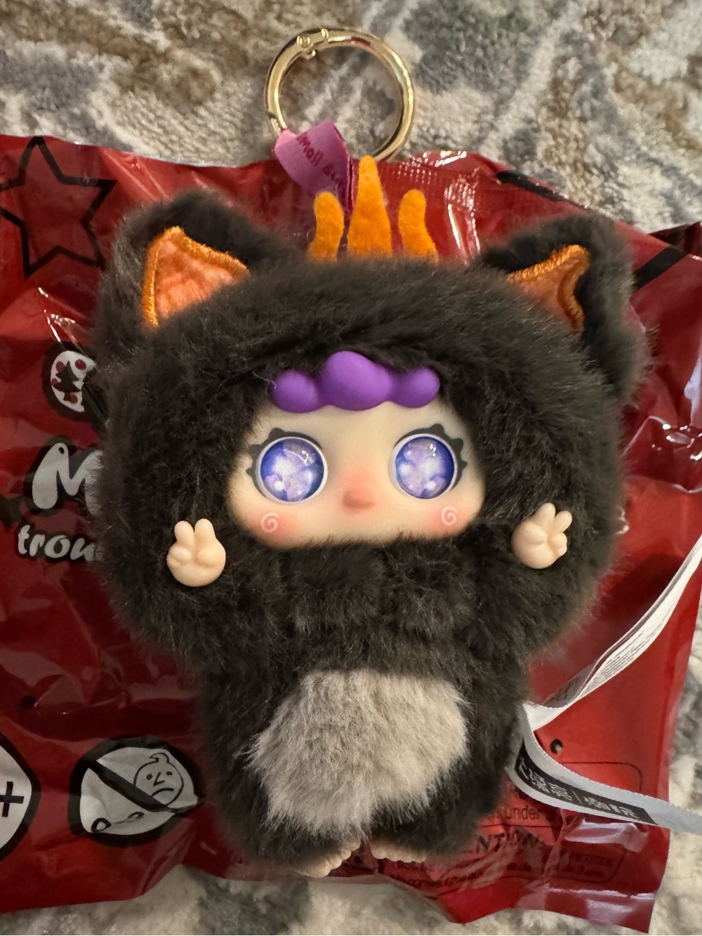 Migo x Baby Three collab keychain